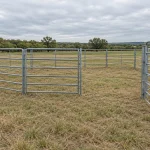 Conceptual empty tubular-panel enclosure on grass with an open entrance gate